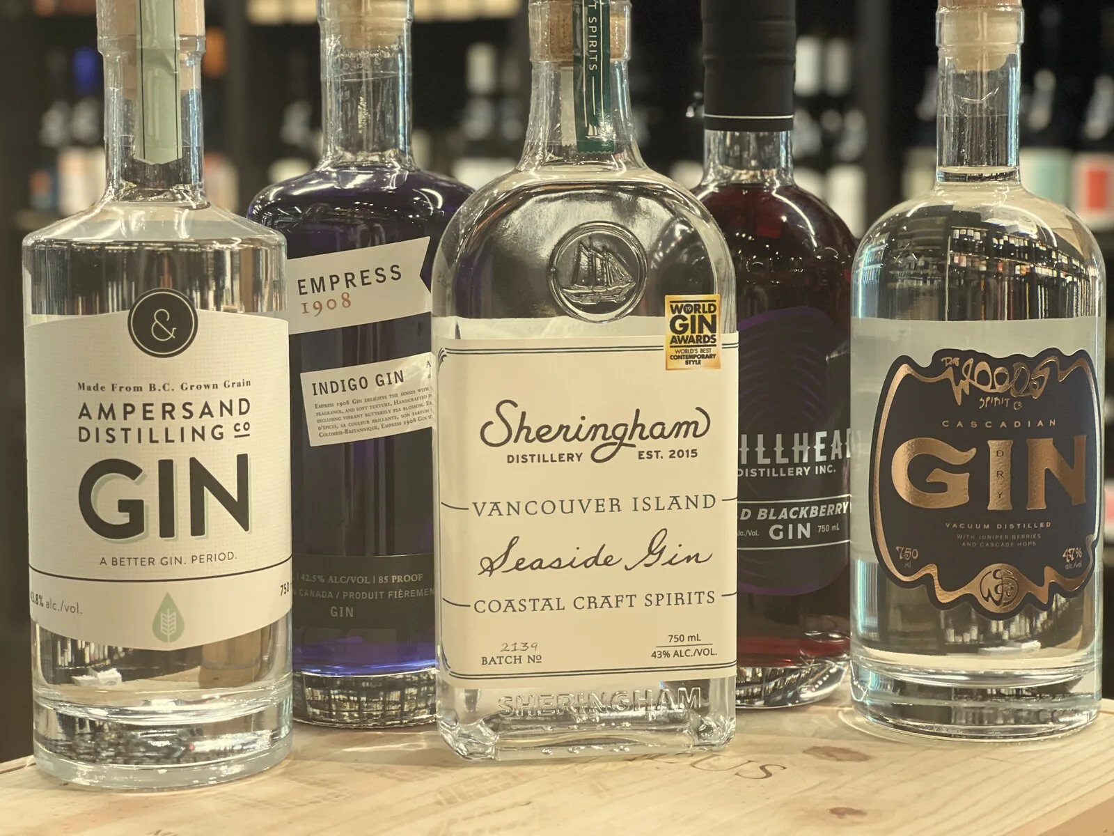 BC gins from Ampersand, Empress 1908, Sheringham, Stillhead and Woods on the counter at Broadway Beer Wine & Spirits